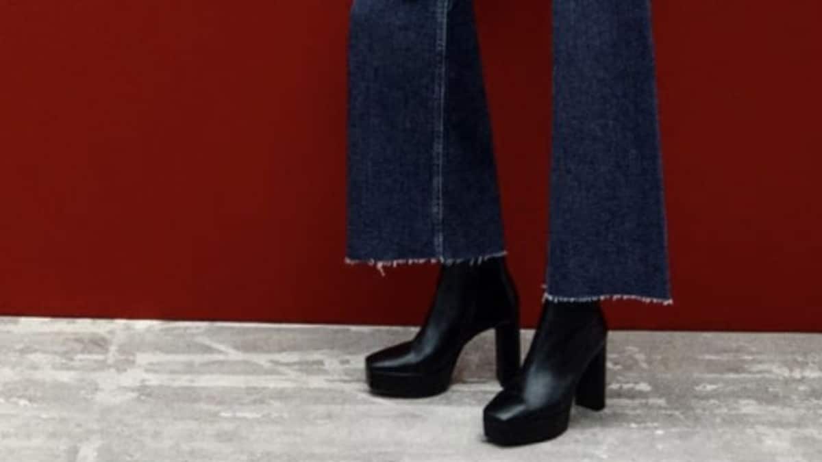 Así es como puedes usar pantalones culotte con botines de forma elegante