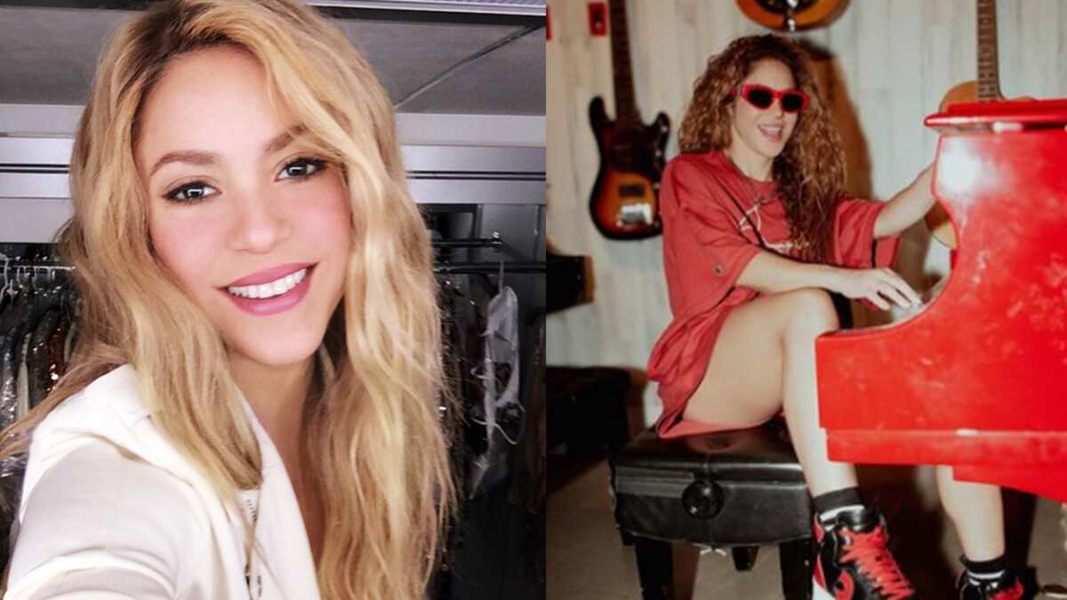 Shakira carga a un hombre