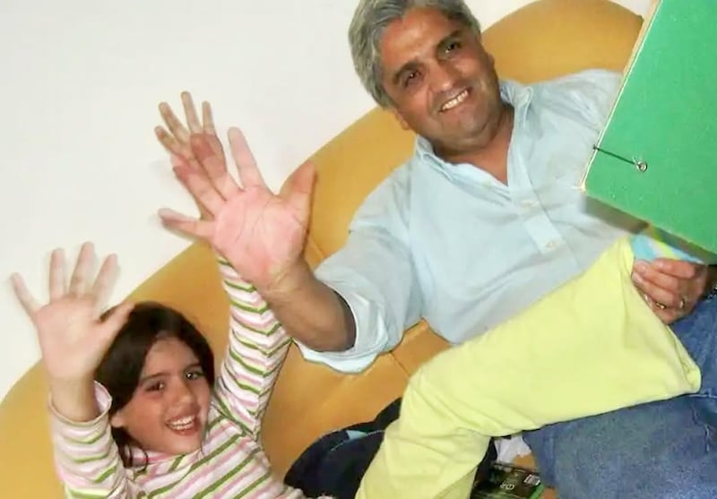 Camilú junto a su padre
