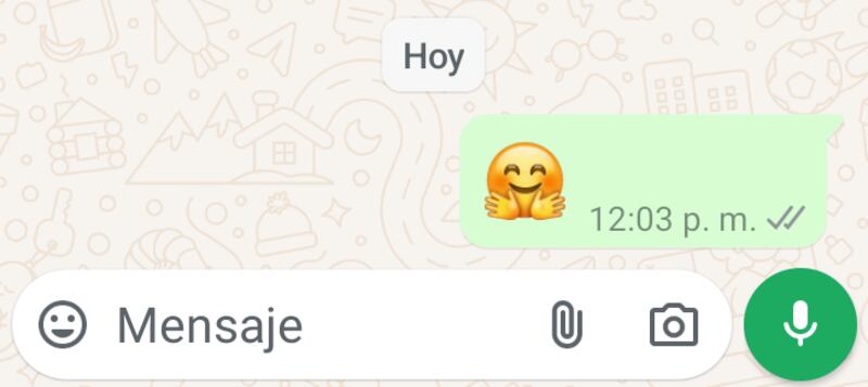 El emoji de carita con manos a los lados es un favorito de muchos en WhatsApp